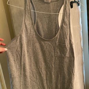 Gray razor back tank with cute little pocket.